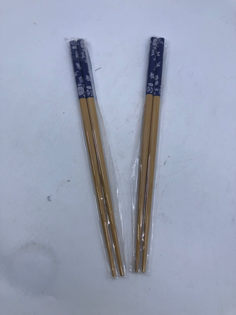 2 PAIR NIP WOODEN CHOP STICKS.