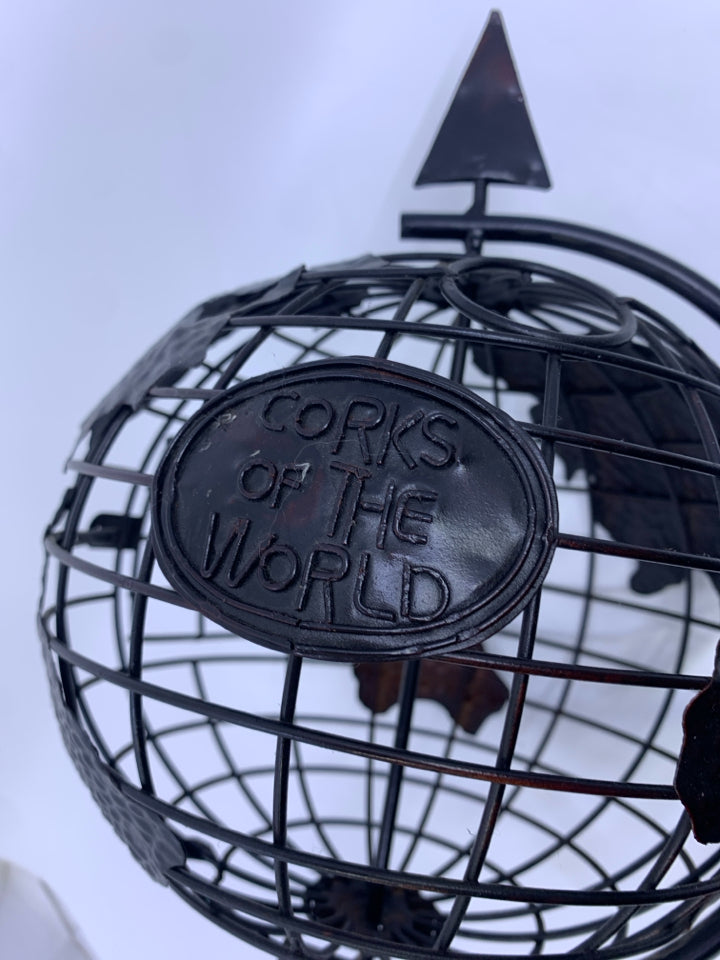 BLACK METAL ROTATING GLOBE CORK HOLDER.