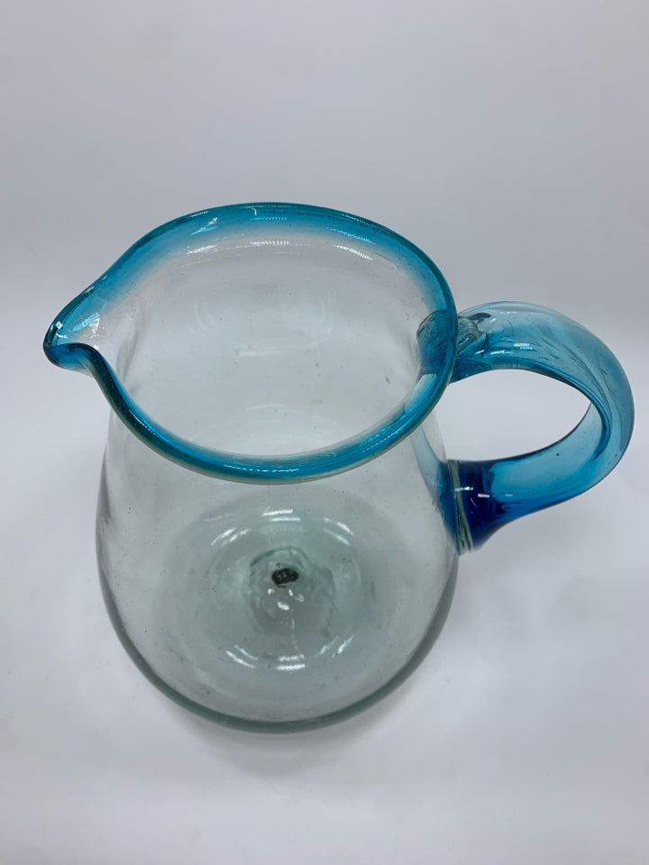 BLOWN GLASS PITCHER W/BLUE HANDLE.