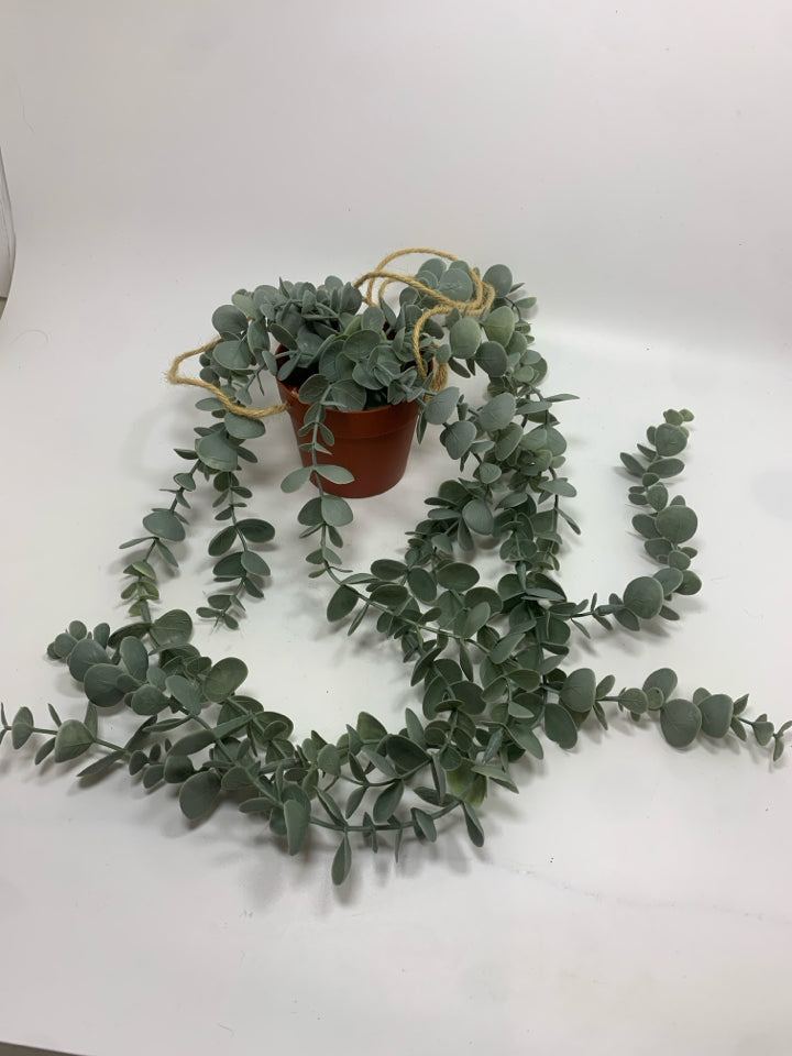 FAUX EUCALYPTUS IN HANGING PLASTIC POT.