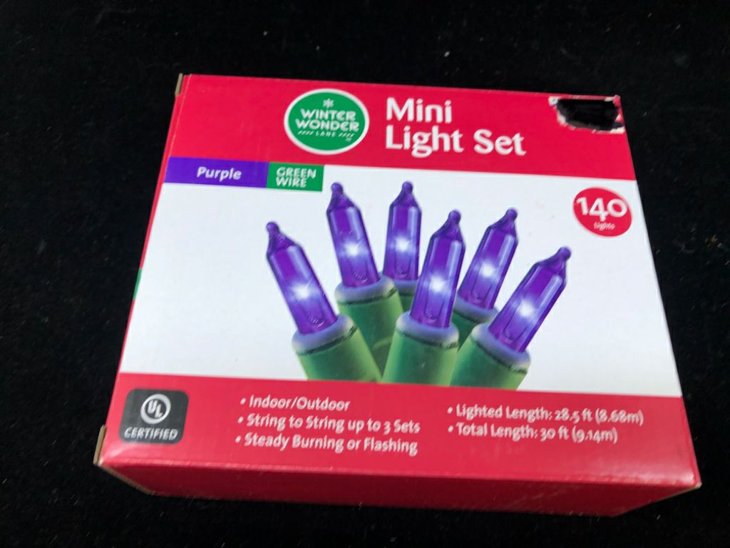 NIB PURPLE MINI LIGHT SET.