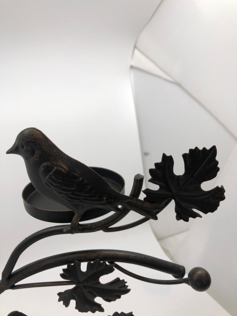 METAL DISTRESSED CANDLE HOLDER W/BIRDS/LEAVES.