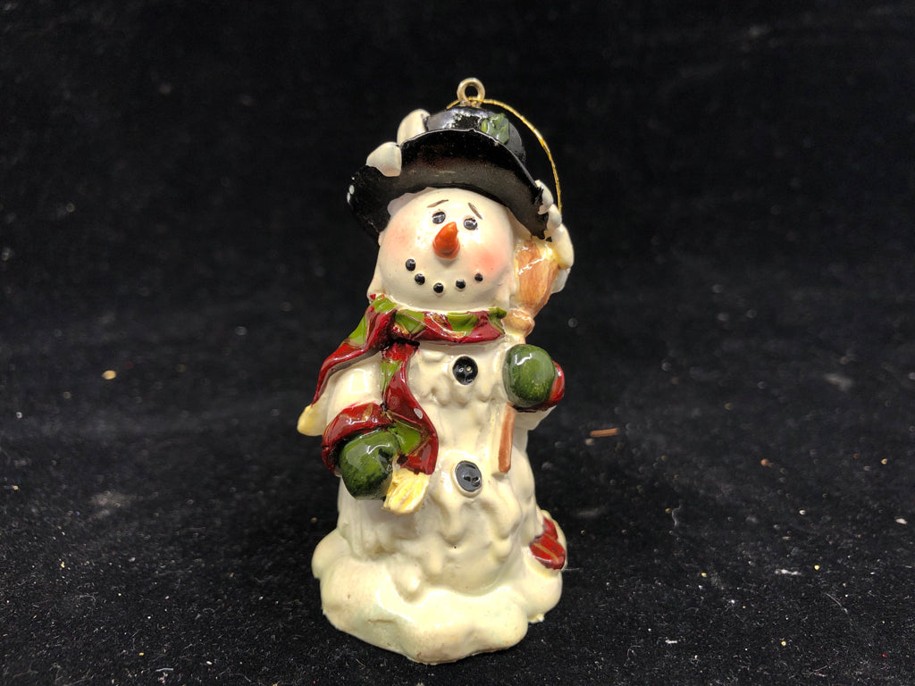 SNOWMAN HOLDING BROOM ORNAMENT.