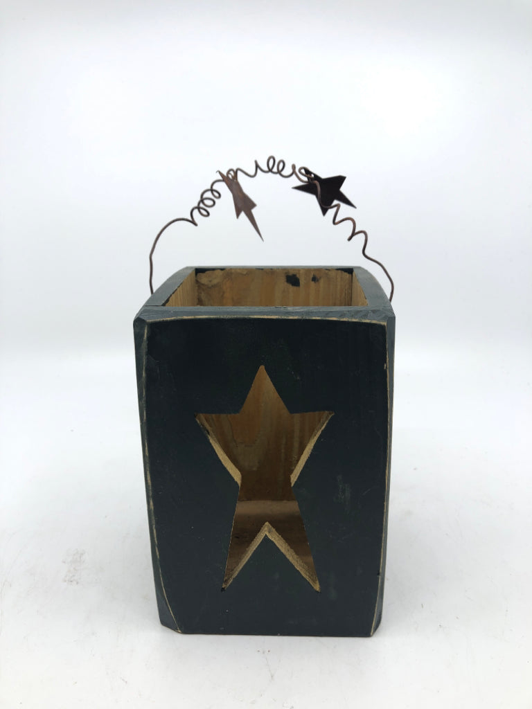 WOOD BLOCK W HANDLE AND CUT OUT STAR.