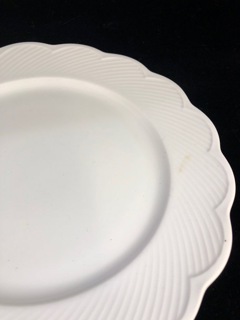 4 RUFFLED EDGE WHITE DANSK PLATES.