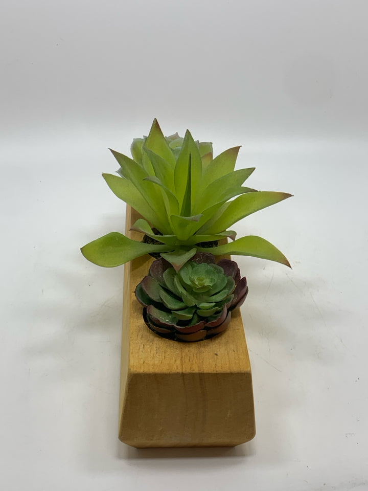 FAUX SUCCULENTS IN WOOD BLOCK.