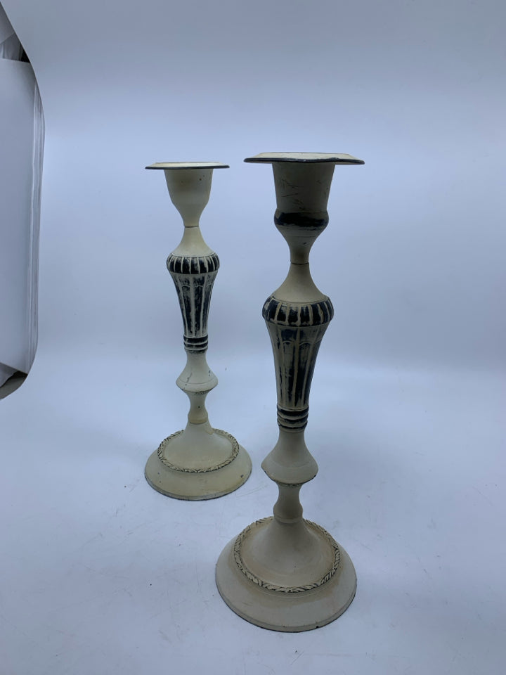 2 IVORY PAINTED METAL TAPER CANDLESTICKS.
