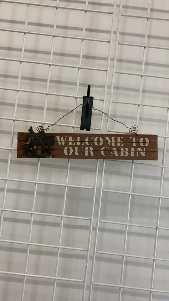 PRIMITIVE WELCOME TO OUR CABIN SIGN.