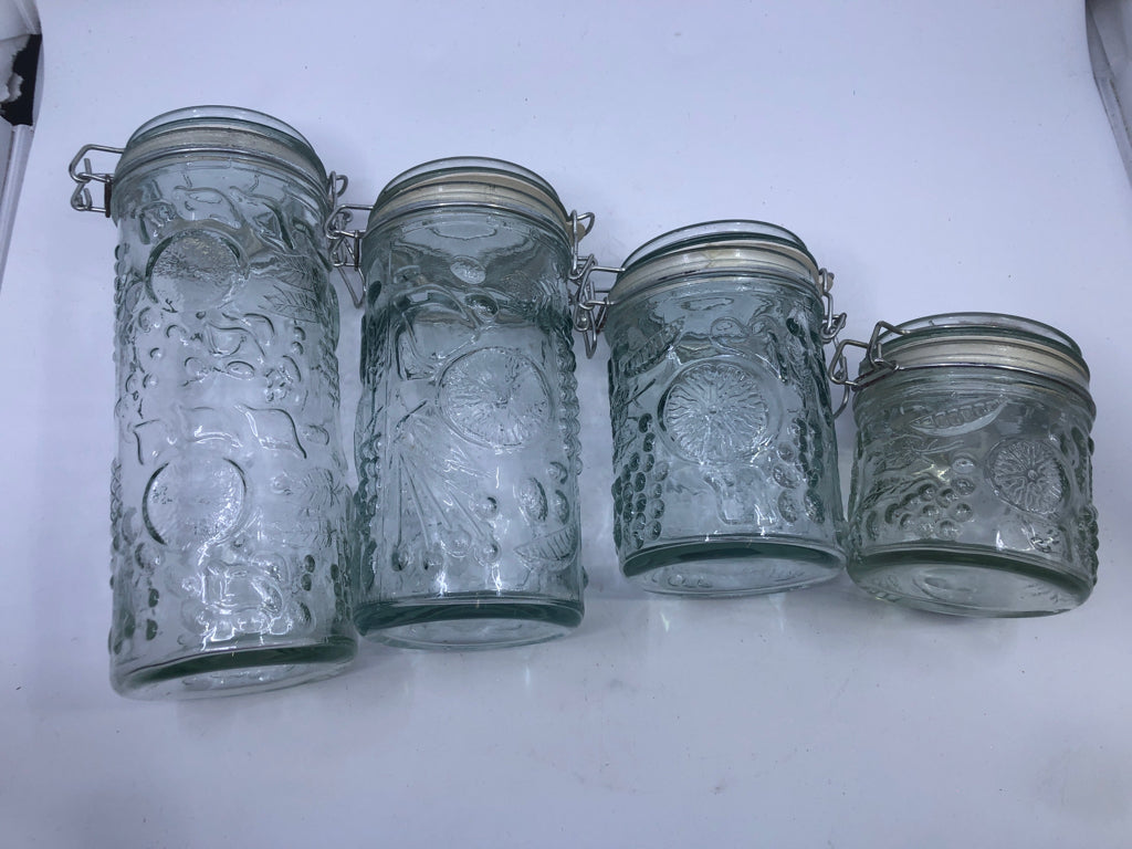 4PC GLASS CANISTER SET W/LOCKING LIDS- FRUIT EMBOSSED.