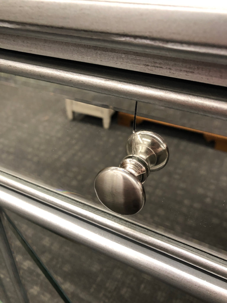 MIRRORED CONSOLE TABLE W/3 DRAWERS & 4 DOORS.