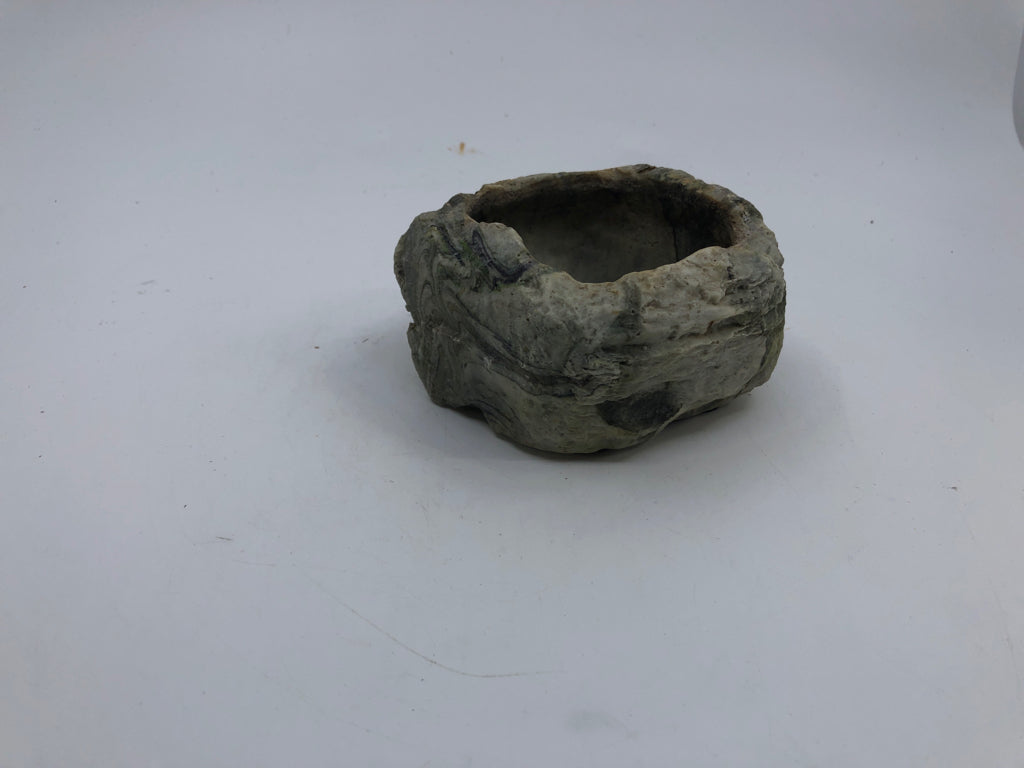 RESIN ROCK PLANTER.