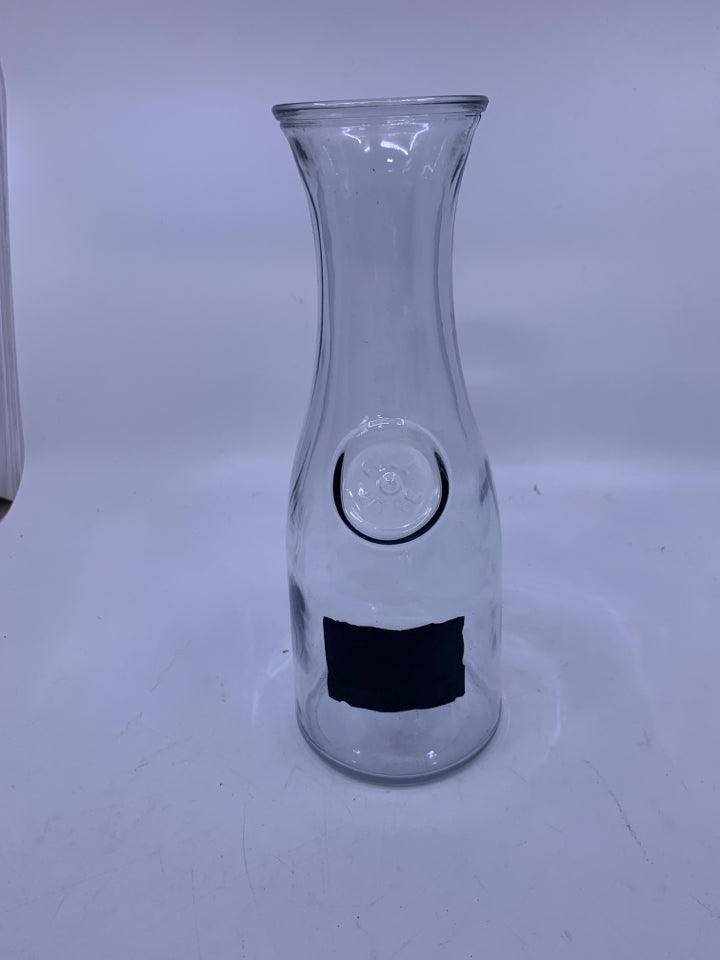 GLASS CARAFE WITH CHALK LABEL.