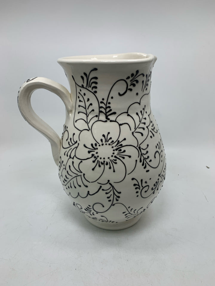 LARGE HEAVY BLACK EMBOSSED FLORAL DETAIL PITCHER/VASE.