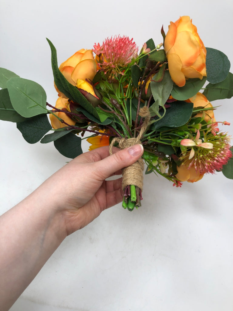 FAUX ORANGE/RED FLOWERS W/TWINE RIBBON.