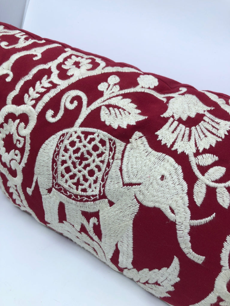 RED AND WHITE RECTANGLE ELEPHANT PILLOW.