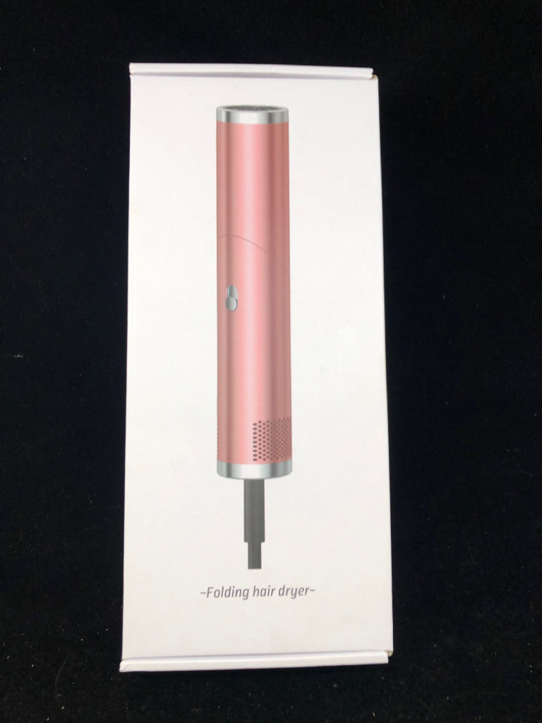 NIB PINK FOLDING HAIR DRYER.
