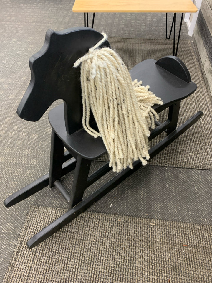 BLACK WOOD ROCKING HORSE W/YARN HAIR.