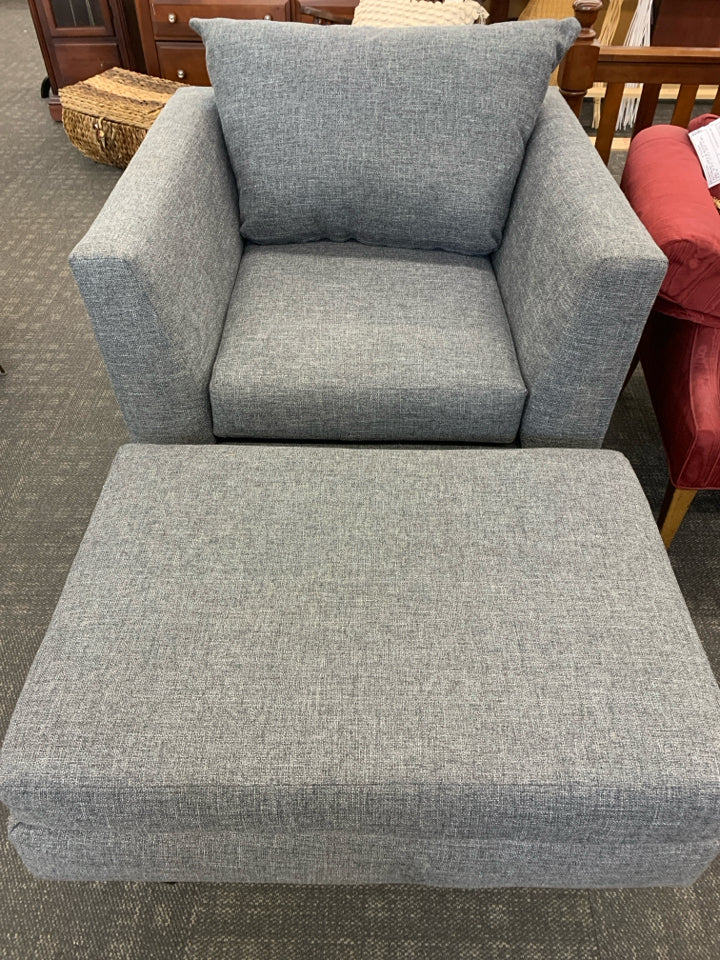UPHOLSTERED GRAY CHAIR W/OTTOMAN.