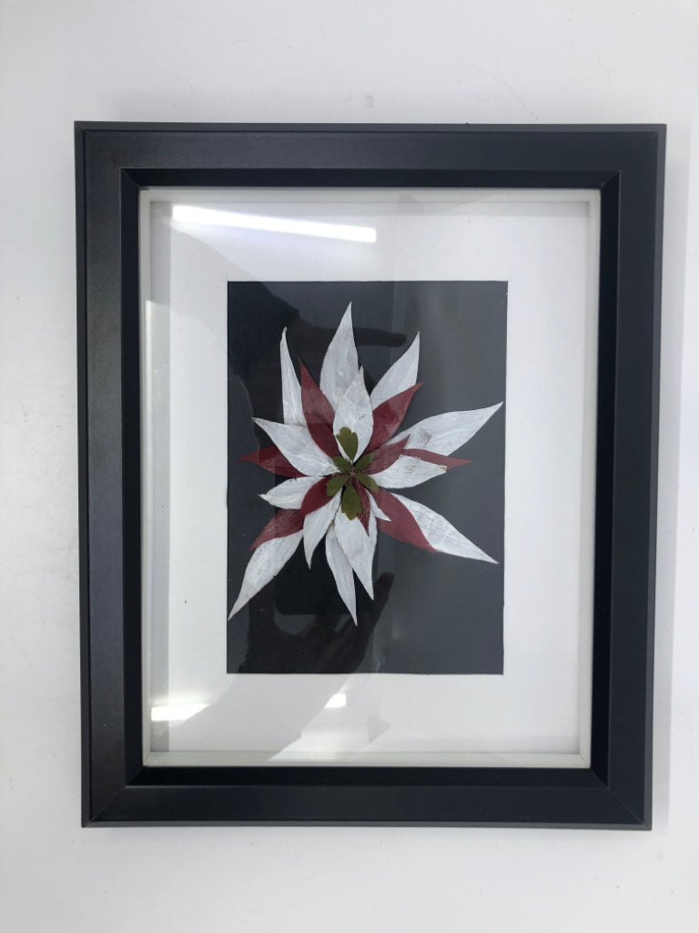 RED AND WHITE FLORAL IN BLACK FRAME.