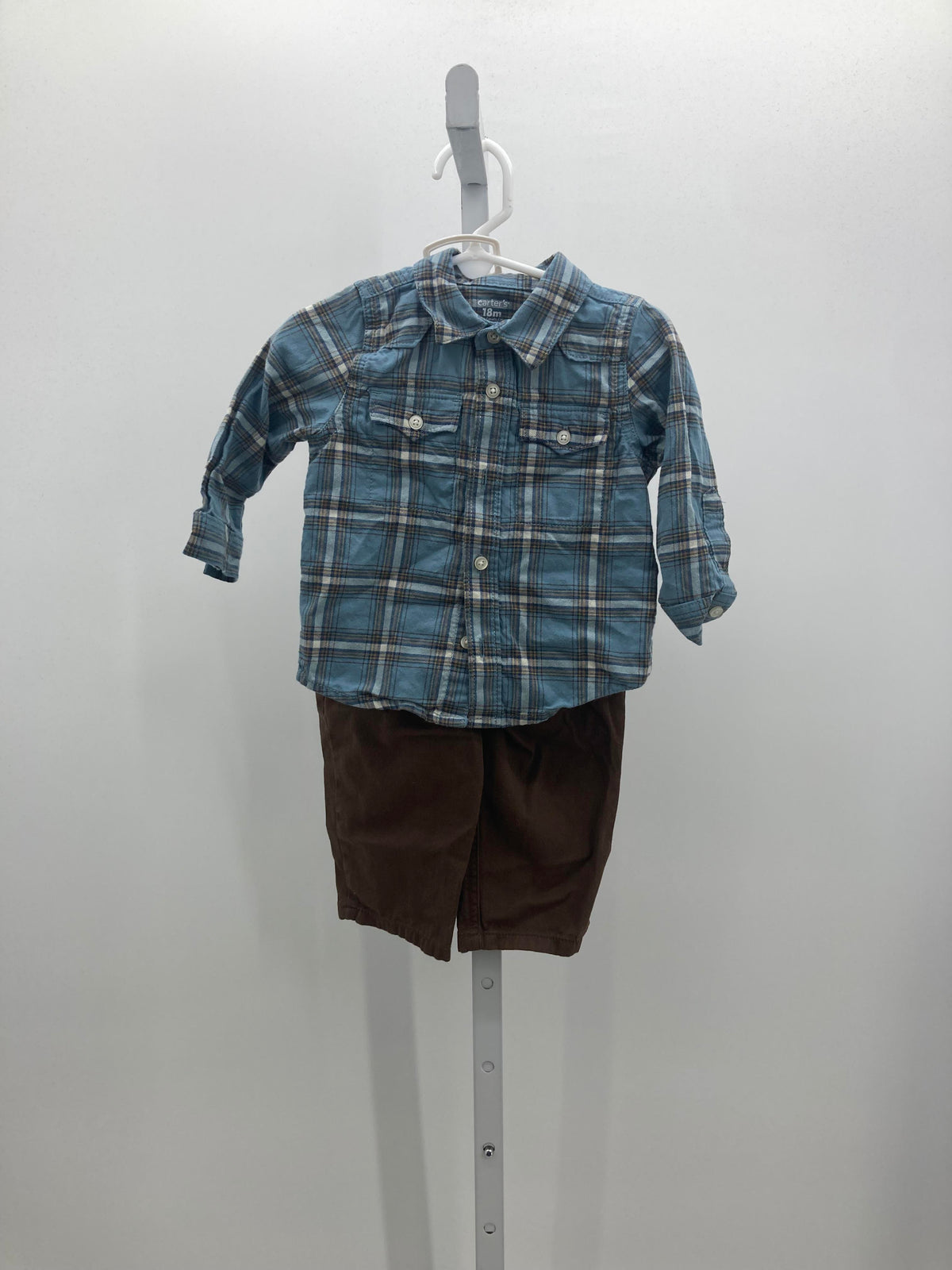 PLAID SHIRT AND BROWN PANTS