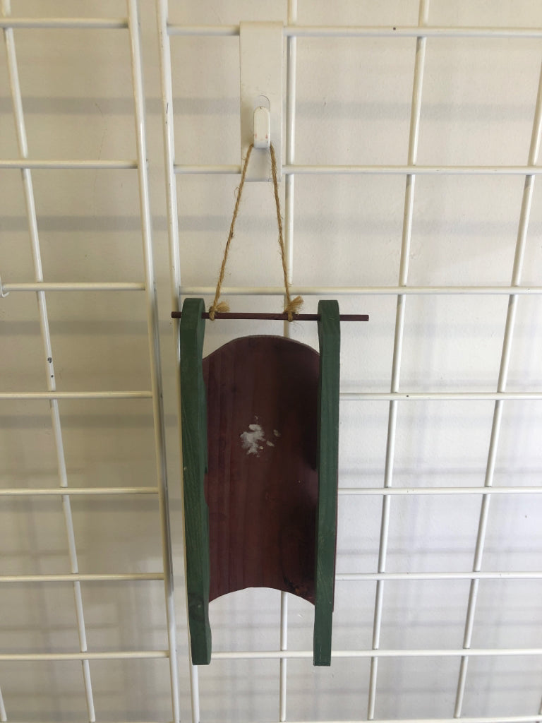 RED/GREEN SNOWMAN HANGING SLED.