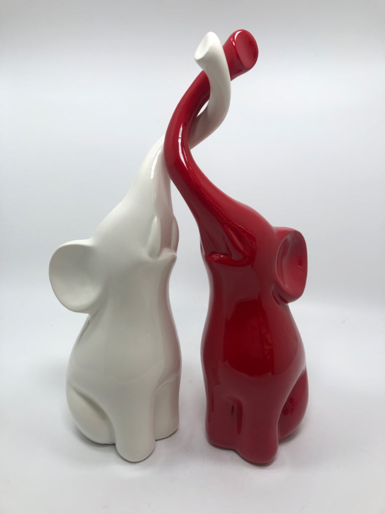 2PC RED/WHITE ELEPHANT SCULPTURE HUGGING.