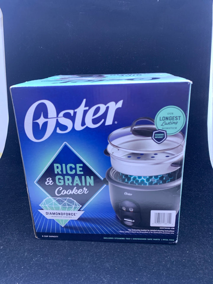 NIB OSTER RICE AND GRAIN COOKER.