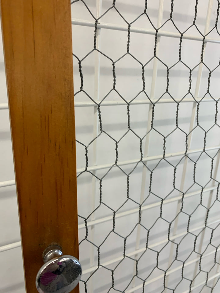 CHICKEN WIRE DECORATIVE DOOR.