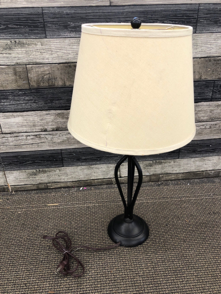 BROWN METAL BASE LAMP W/TAN SHADE.