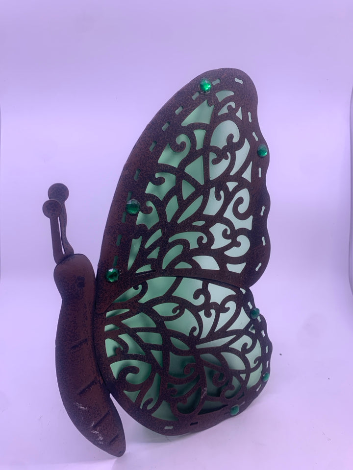 GREEN METAL BUTTERFLY TEA LIGHT HOLDER.
