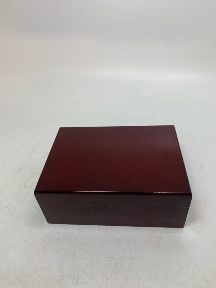 SMALL GLOSSY CHERRY COLORED BOX.