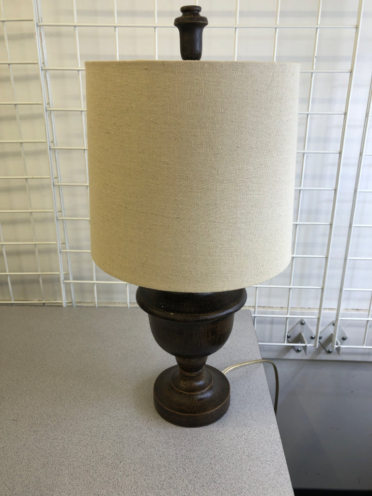 BROWN BASE LAMP W CREAM SHADE.