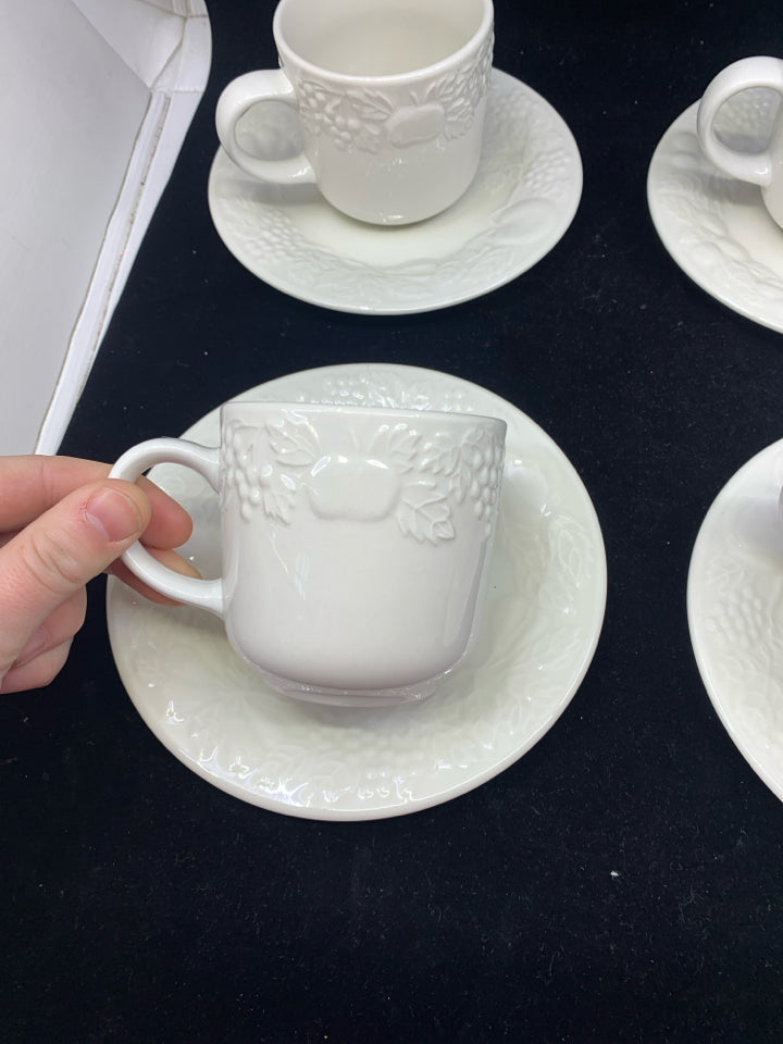 12 PC WHITE GIBSON EMBOSSED FRUIT TEACUPS AND SAUCERS.