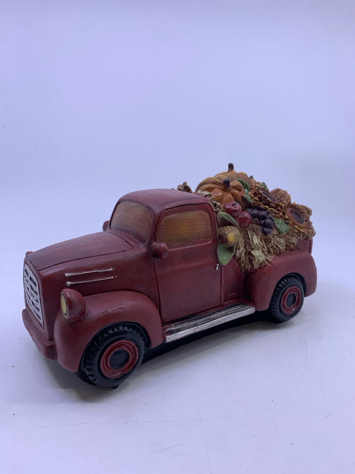 RED CERAMIC TRUCK WITH PUMPKINS/SUNFLOWERS.