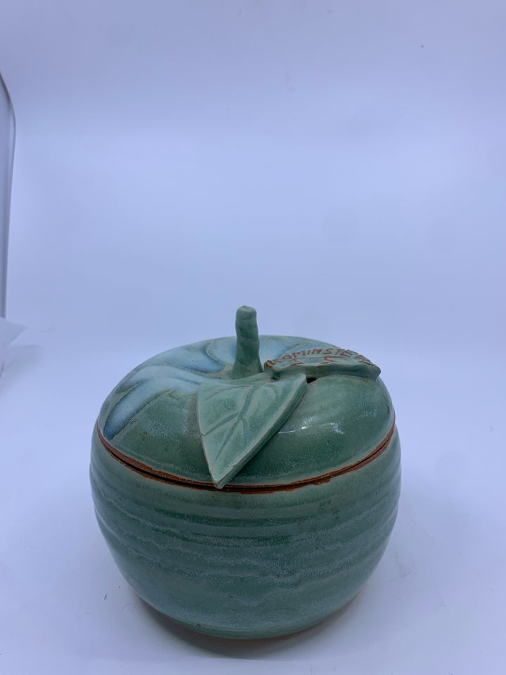 APPLE SHAPED POTTERY CANISTER W/ LEOMINSTER CARVED INTO LEAF.