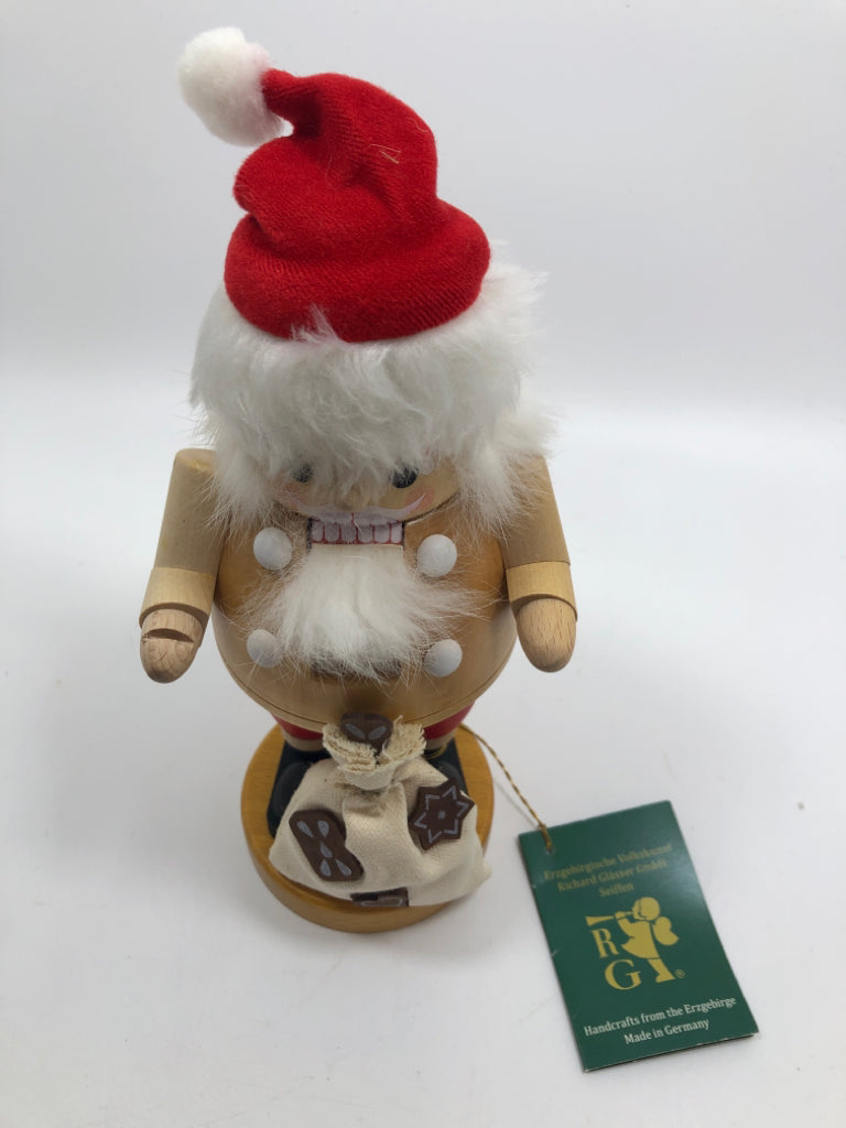 RG GERMAN- SANTA NUT CRACKER W/ BAG OF COOKIES.
