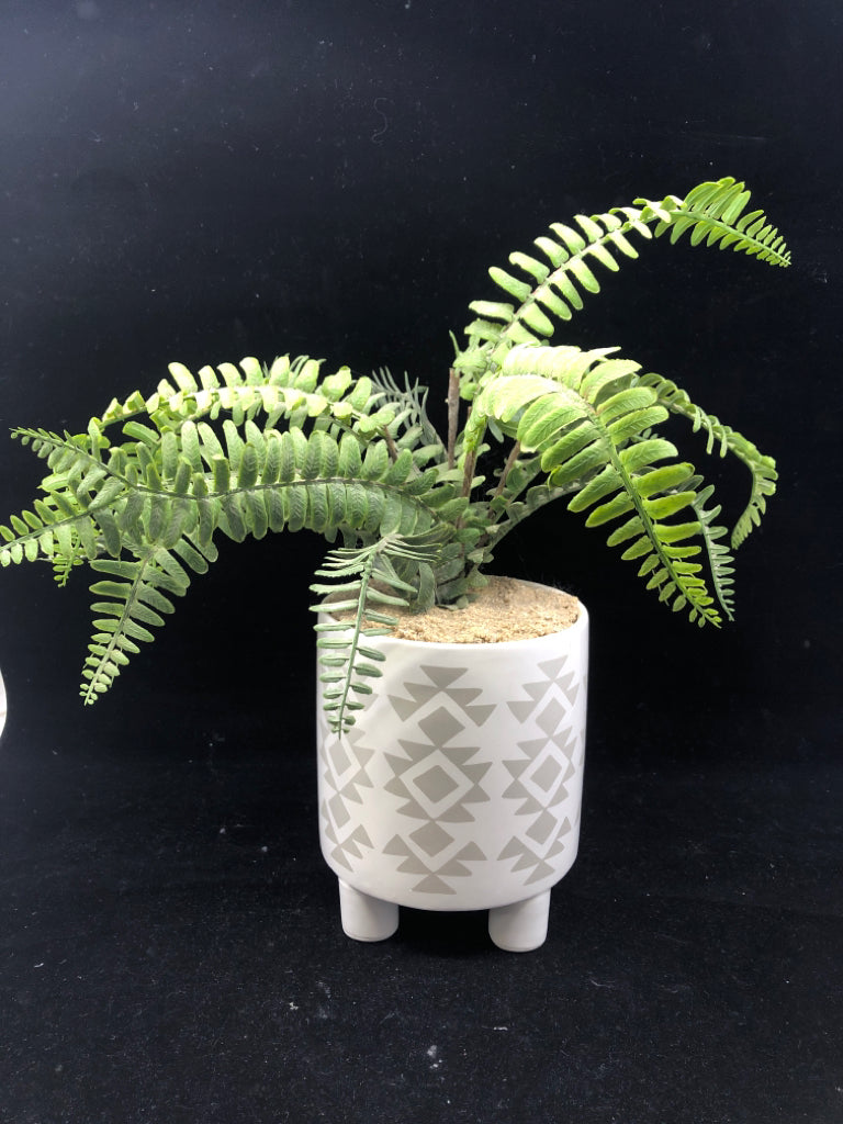 FAUX FERN IN WHITE PLANTER.