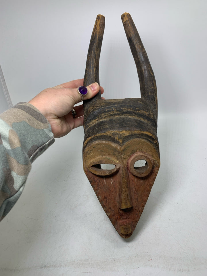 WOOD CARVED WINKING MASK W/ POINTED EARS.