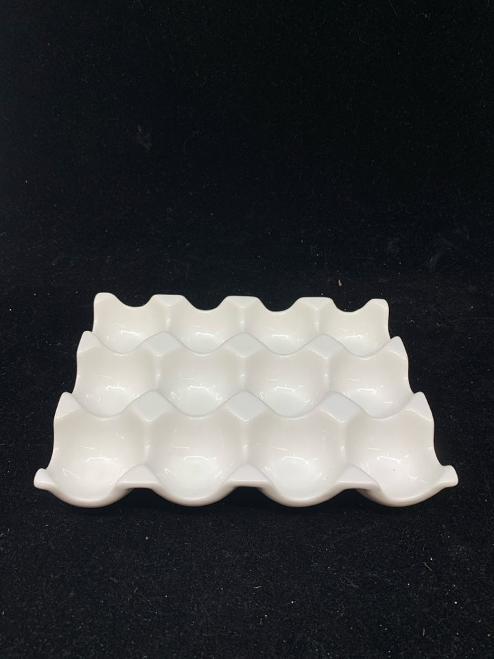 WHITE CERAMIC EGG HOLDER.