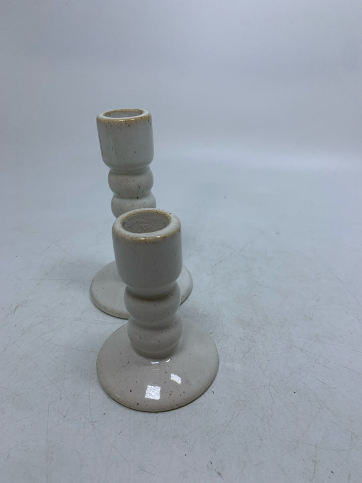 2 CERAMIC SHORT TAPERED CANDLE HOLDERS.