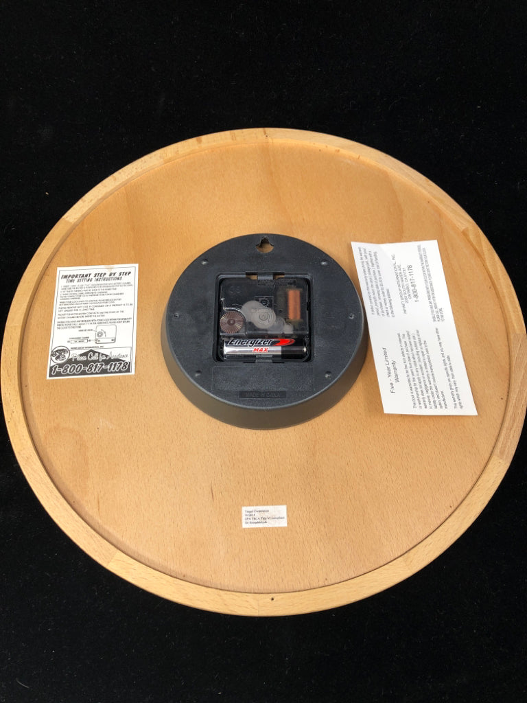 WOODEN CONTEMPORARY CLOCK.