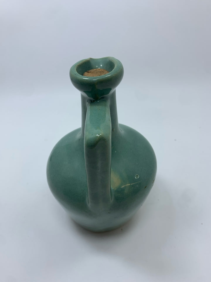 GREEN GLAZED POTTERY PITCHER W/STOPPER.