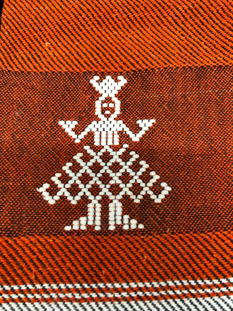 ORANGE WOVEN TEA TOWEL W/DANCER.