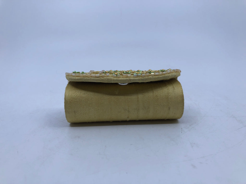 YELLOW BEADED LIPSTICK HOLDER.