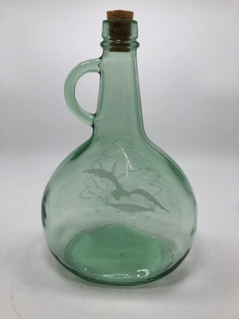 GREEN GLASS JUG W/ETCHED BIRD & FINGER LOOP HANDLE.