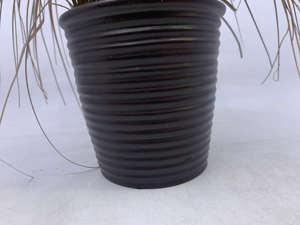 FAUX DRIED GRASS IN RED BROWN PLANTER.