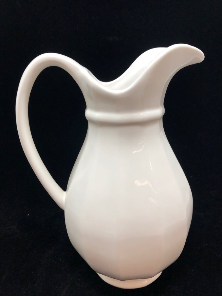 WHITE CERAMIC PITCHER.