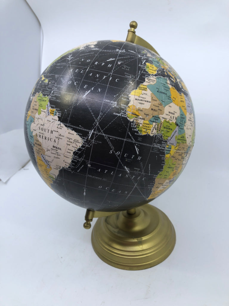 BLACK GLOBE ON GOLD STAND.