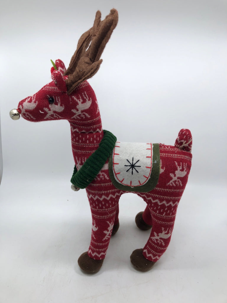 STANDING RED PLUSH REINDEER W/ GREEN COLLARS.