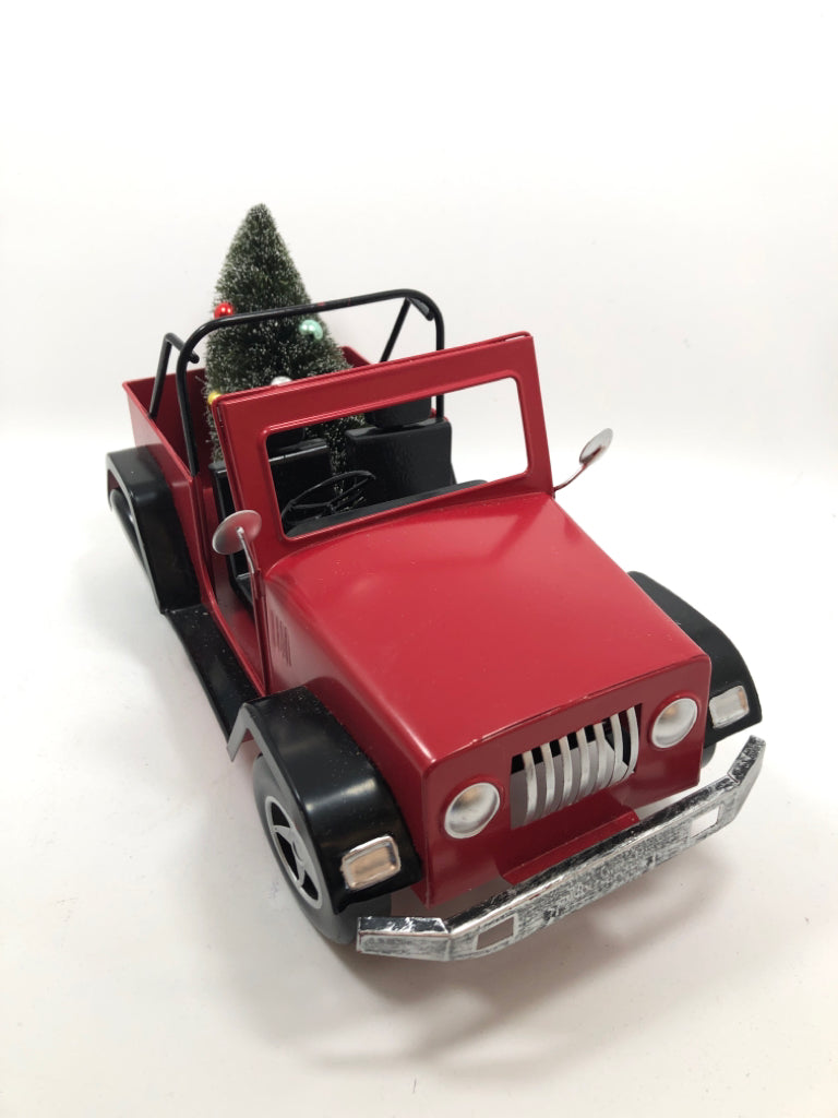 RED METAL JEEP W/CHRISTMAS TREE.